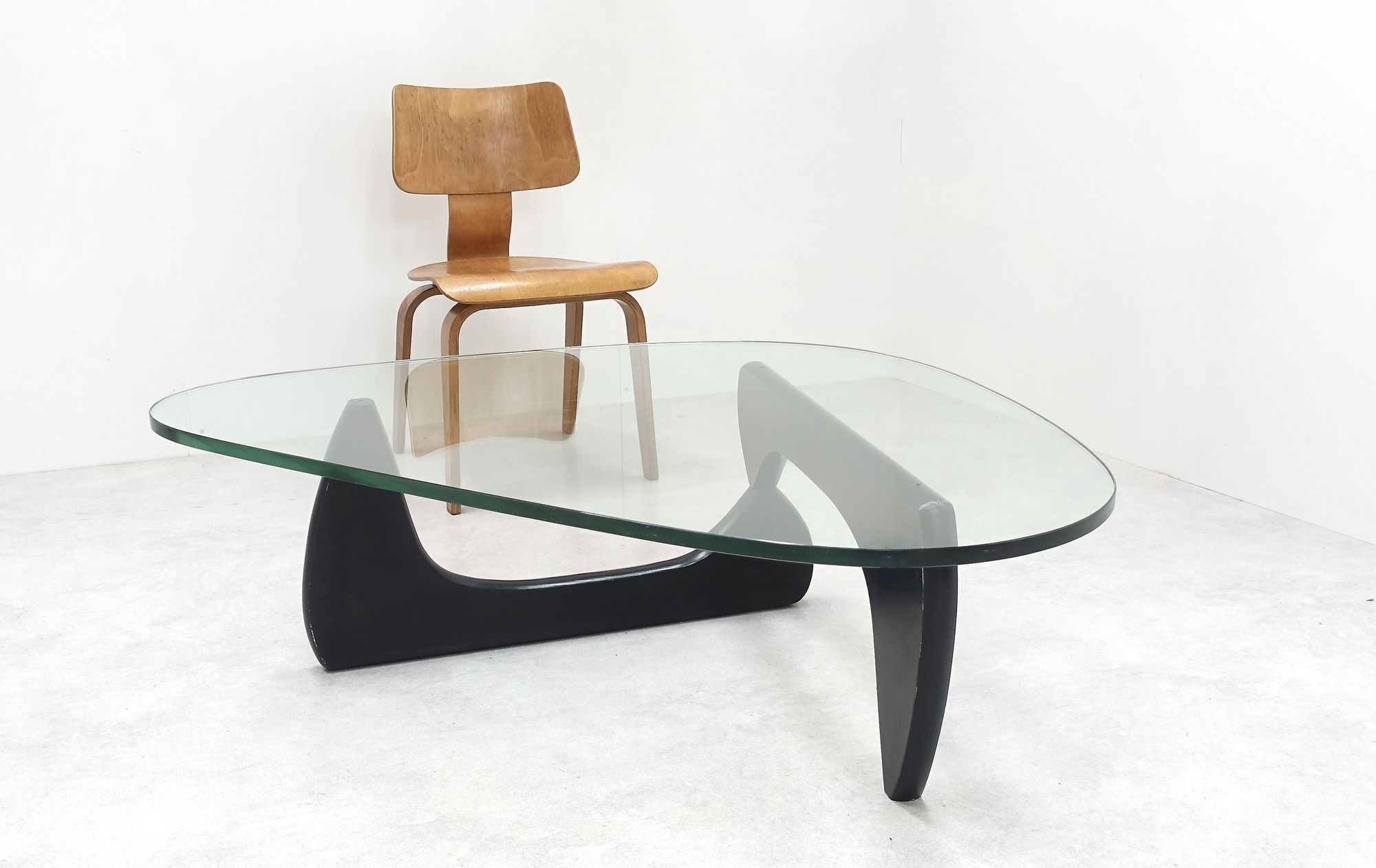 coffee table by Isamu Noguchi ant Swiss chair 50s